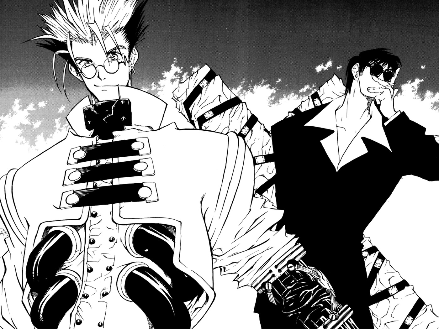 A two-page spread from the manga featuring Vash and Wolfwood.